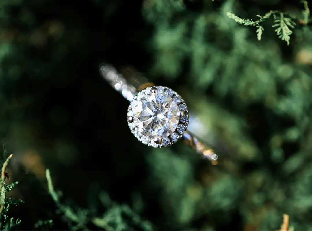 handcrafted jewelry pieces on marble with soft light and golden highlights